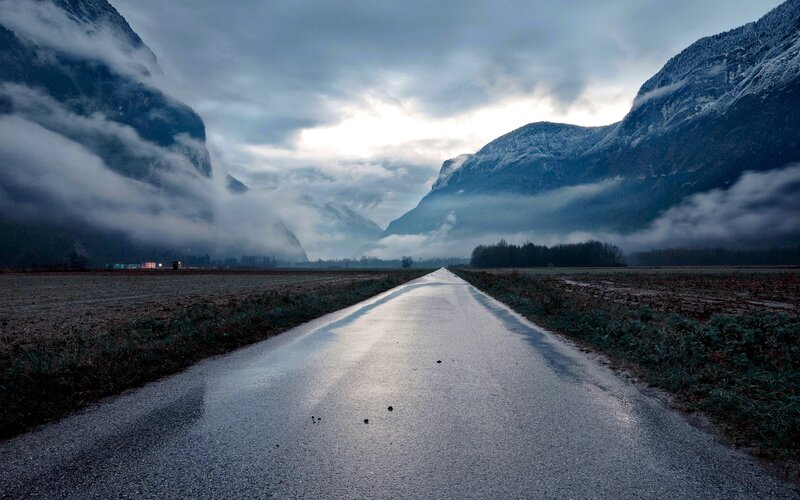 Wet Road in Mountain Valley — Gray
