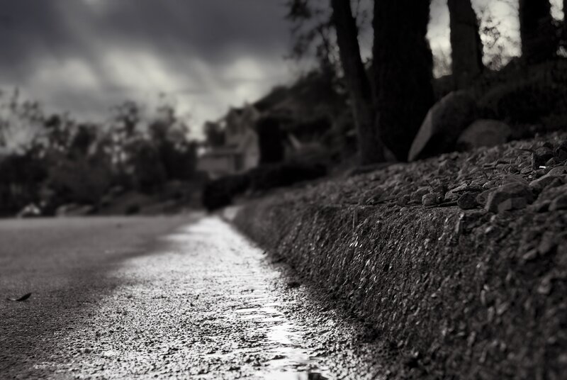 wet road under stormy sky