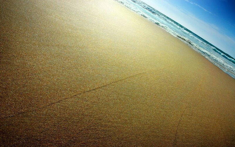 Wet Sand at Beach — Brown