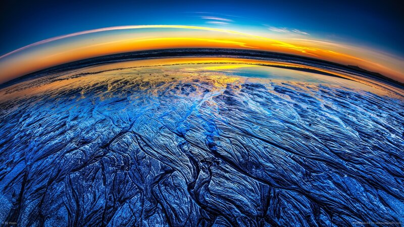 Wet Sand Patterns at Sunset