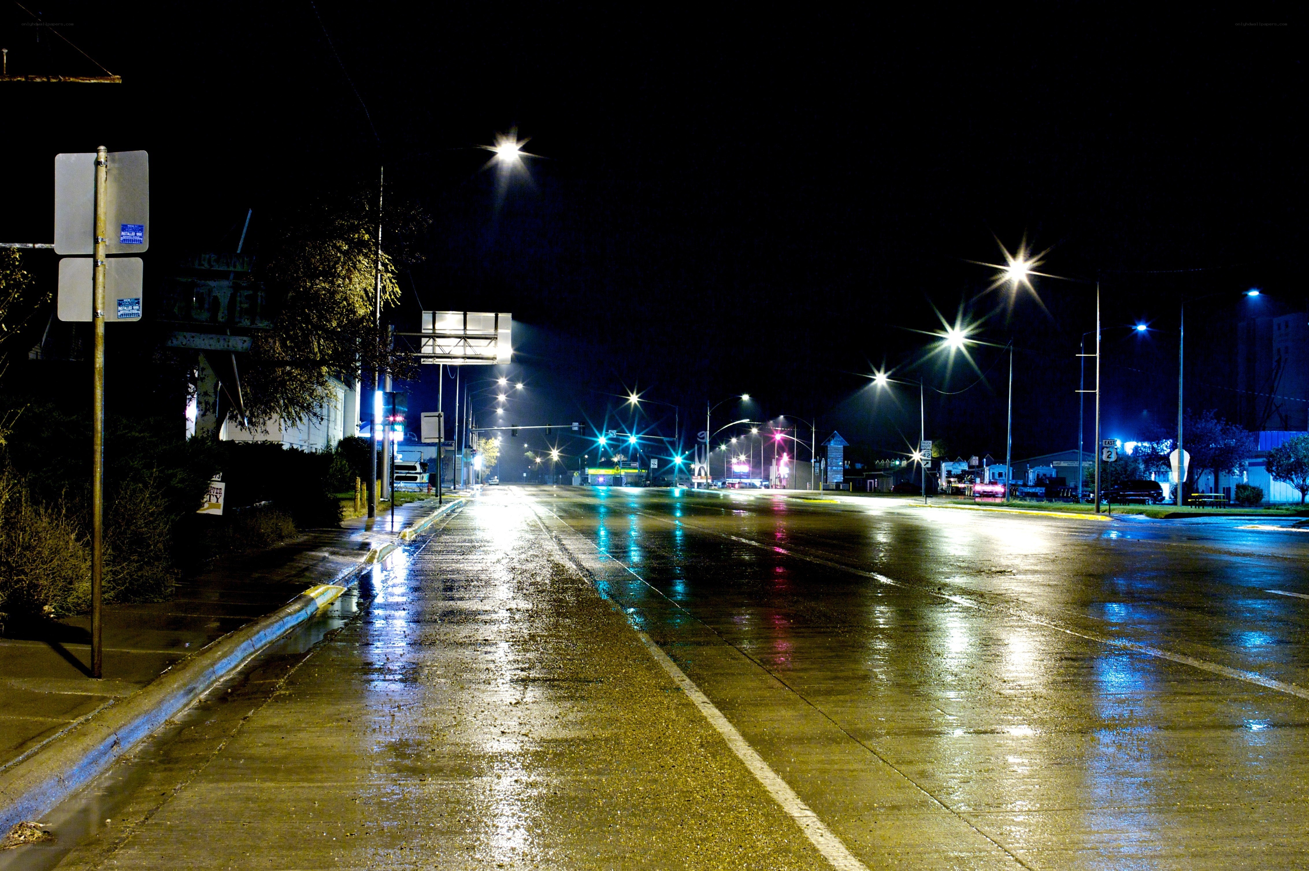 Wet street at night