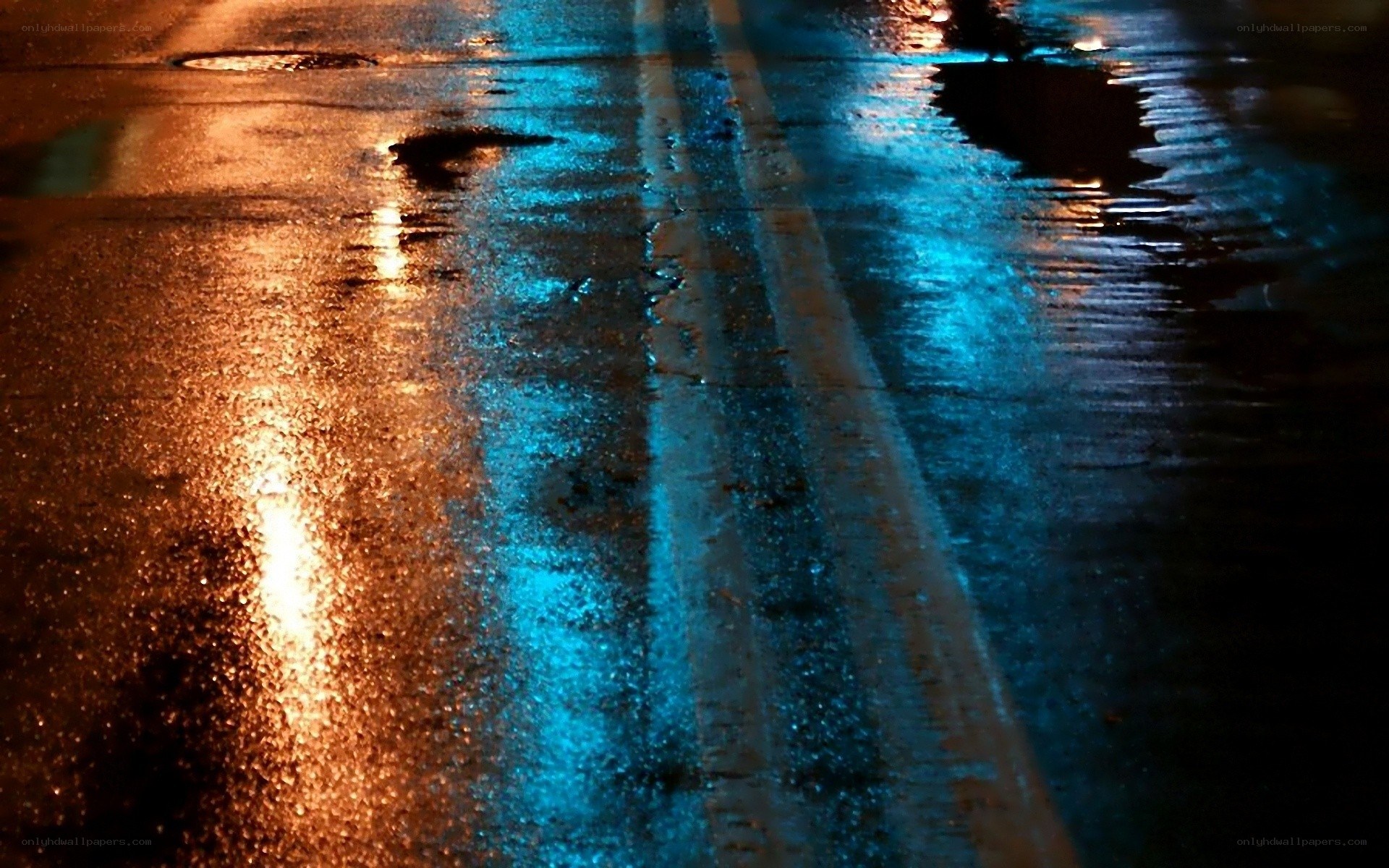 wet street at night with lights