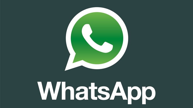 WhatsApp logo on dark background