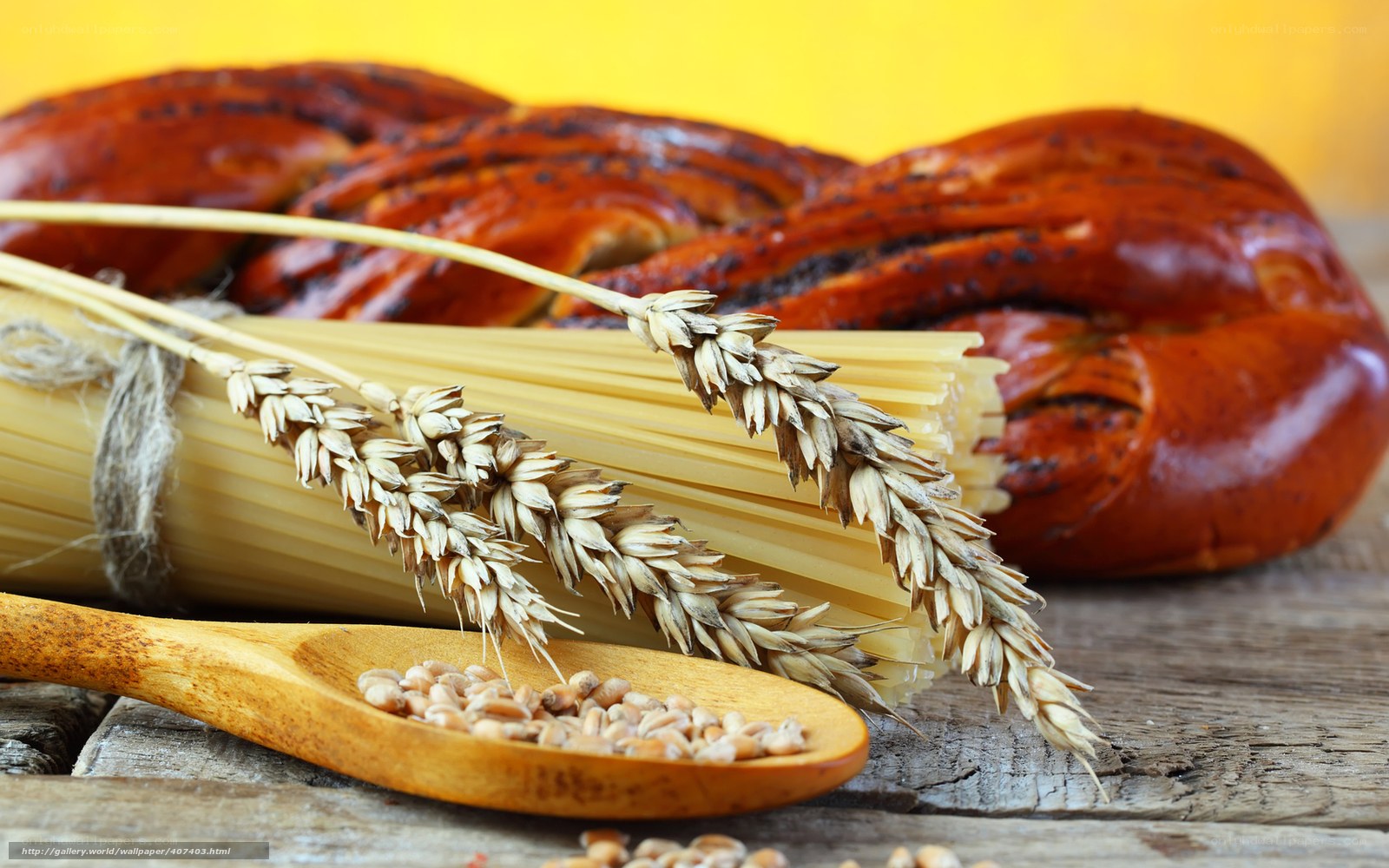 wheat and pasta on wood