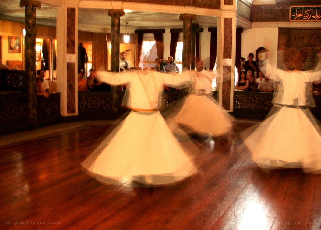 Whirling dervishes performing