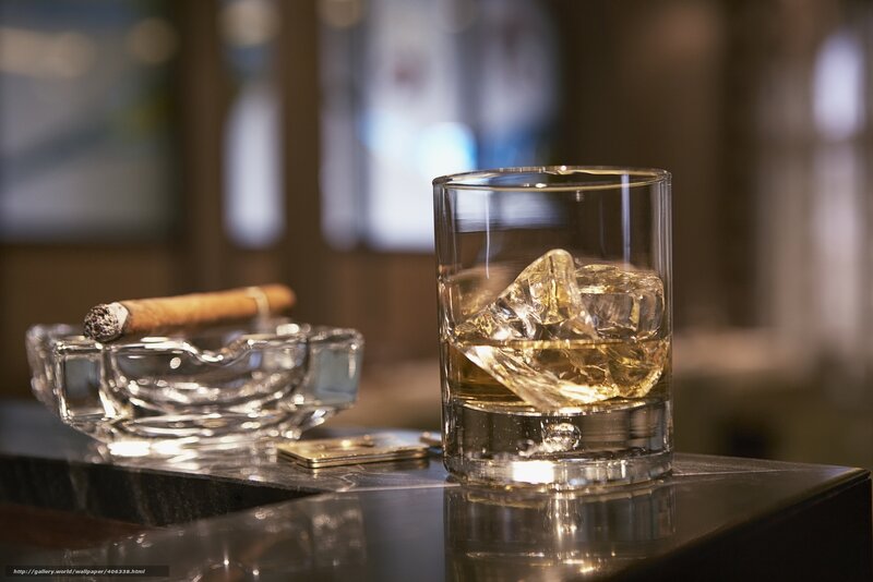 whiskey and cigar on bar