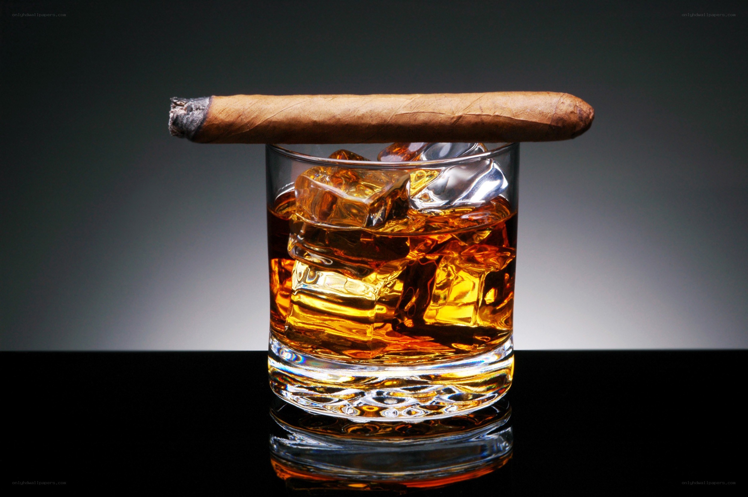 whiskey and cigar on ice
