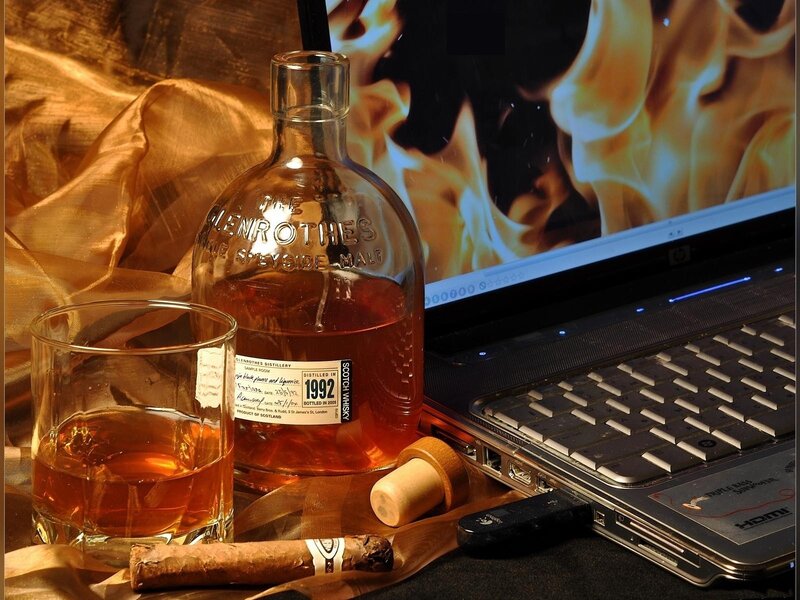 Whiskey Bottle and Laptop