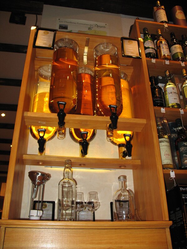 whiskey dispensers at a bar