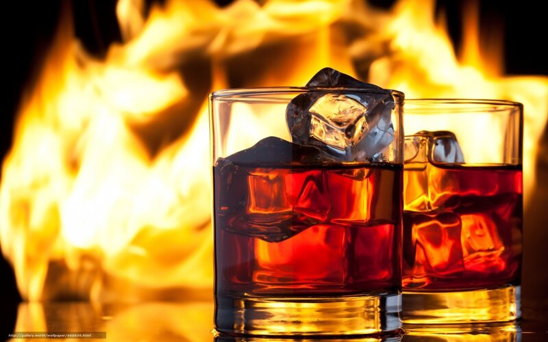 whiskey glasses with fire