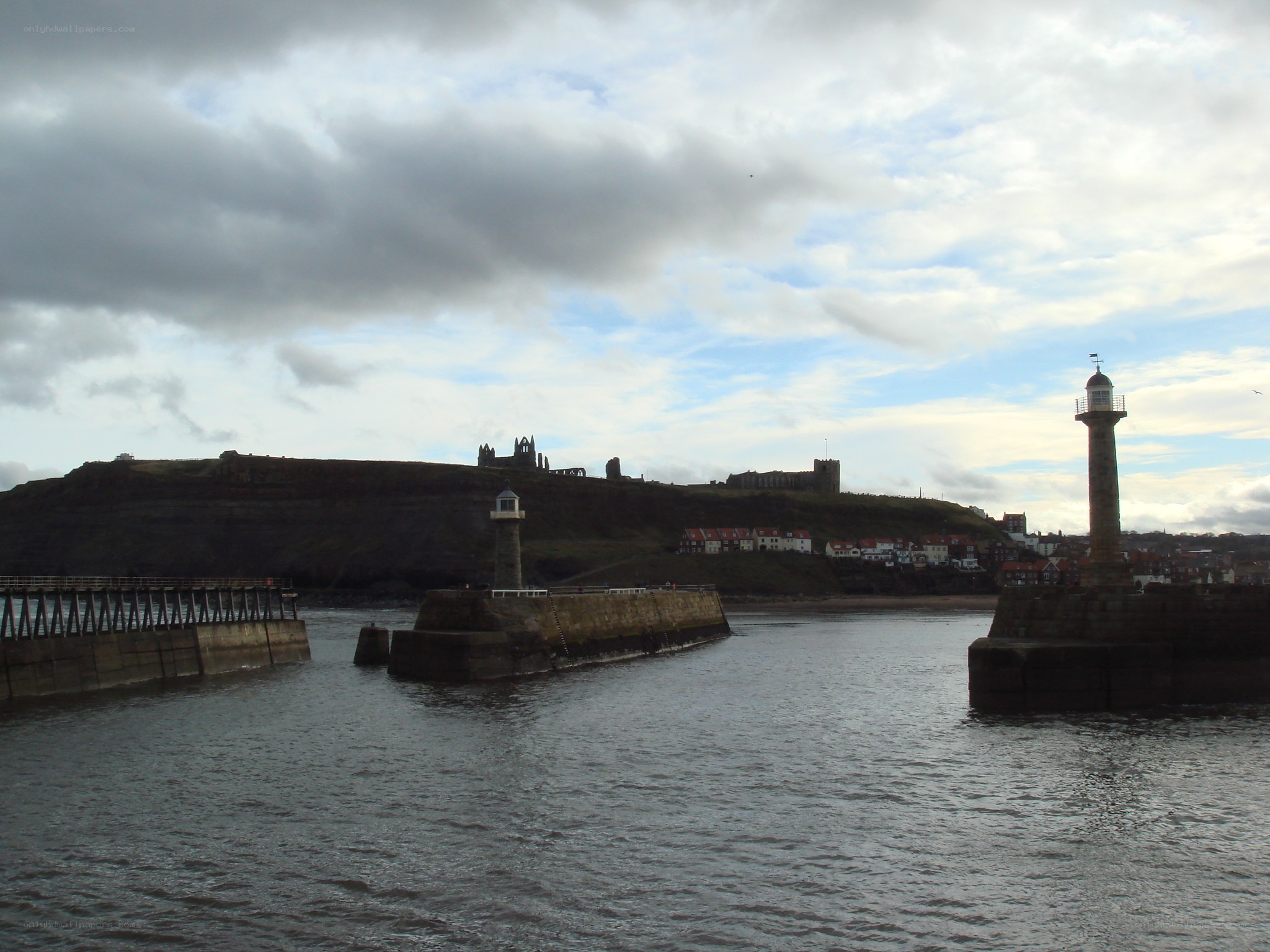 Whitby harbor with lighthouses