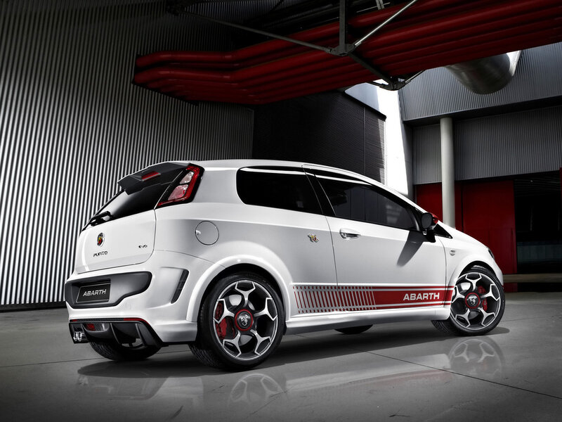 White Abarth Car — Dramatic, Photograph, Building