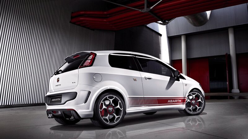 White Abarth Car — Dramatic, Photograph, Building, Wheels