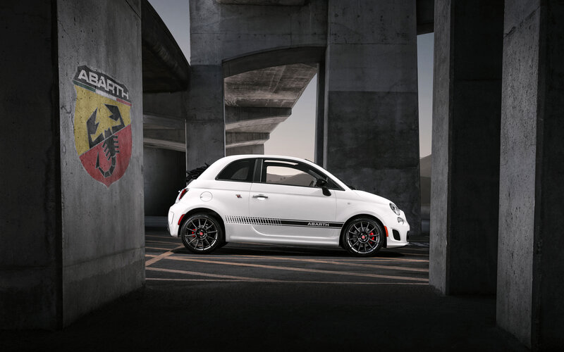 White Abarth Car — Dramatic, Photograph, Concrete Pillars