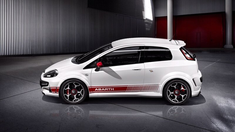 White Abarth car in garage