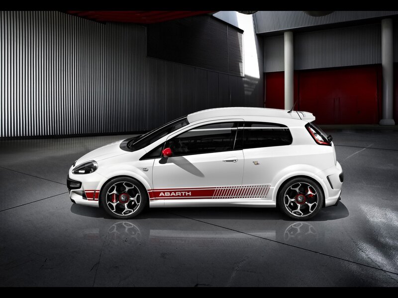 White Abarth car in garage