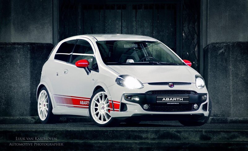 White Abarth car on steps