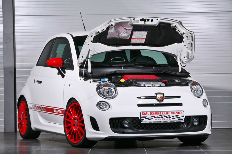 White Abarth car with open hood