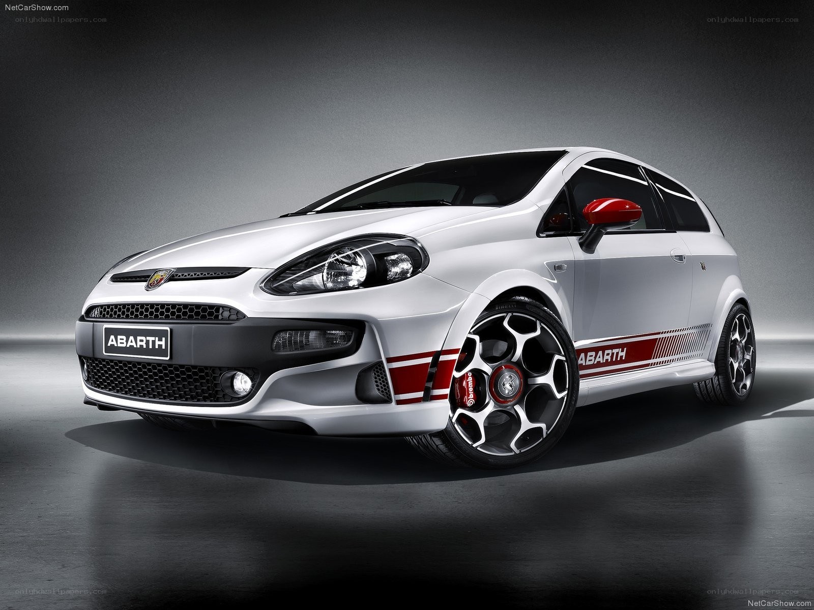 White Abarth car with red accents