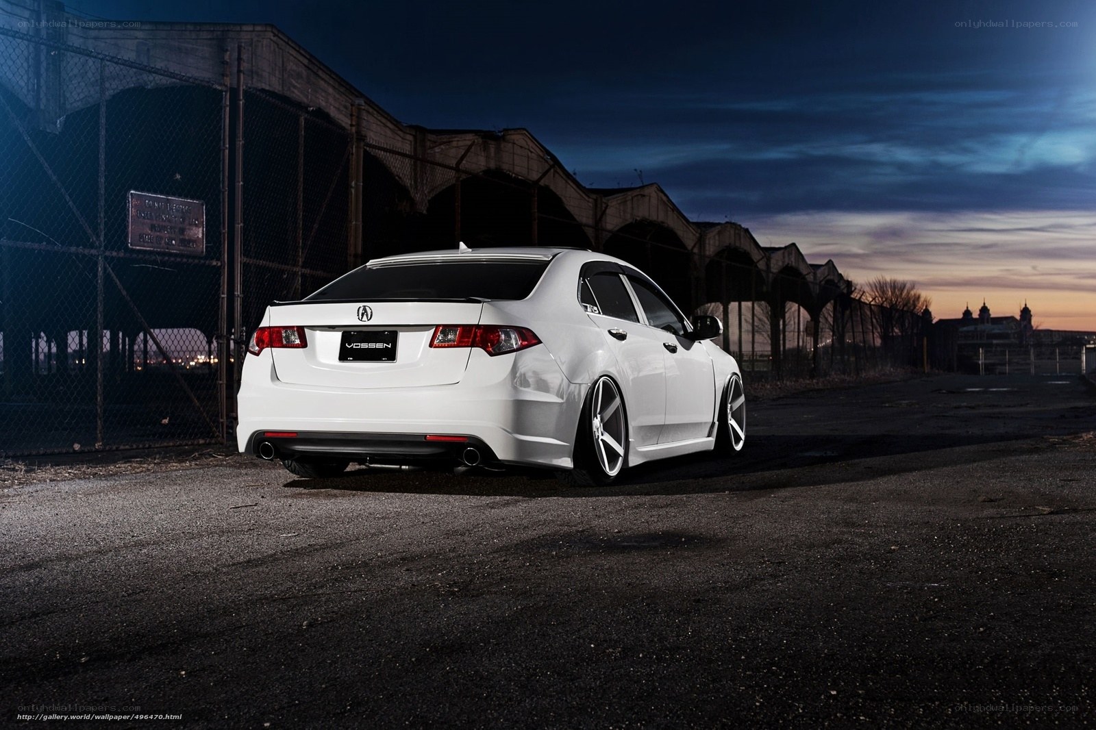 white acura in industrial setting