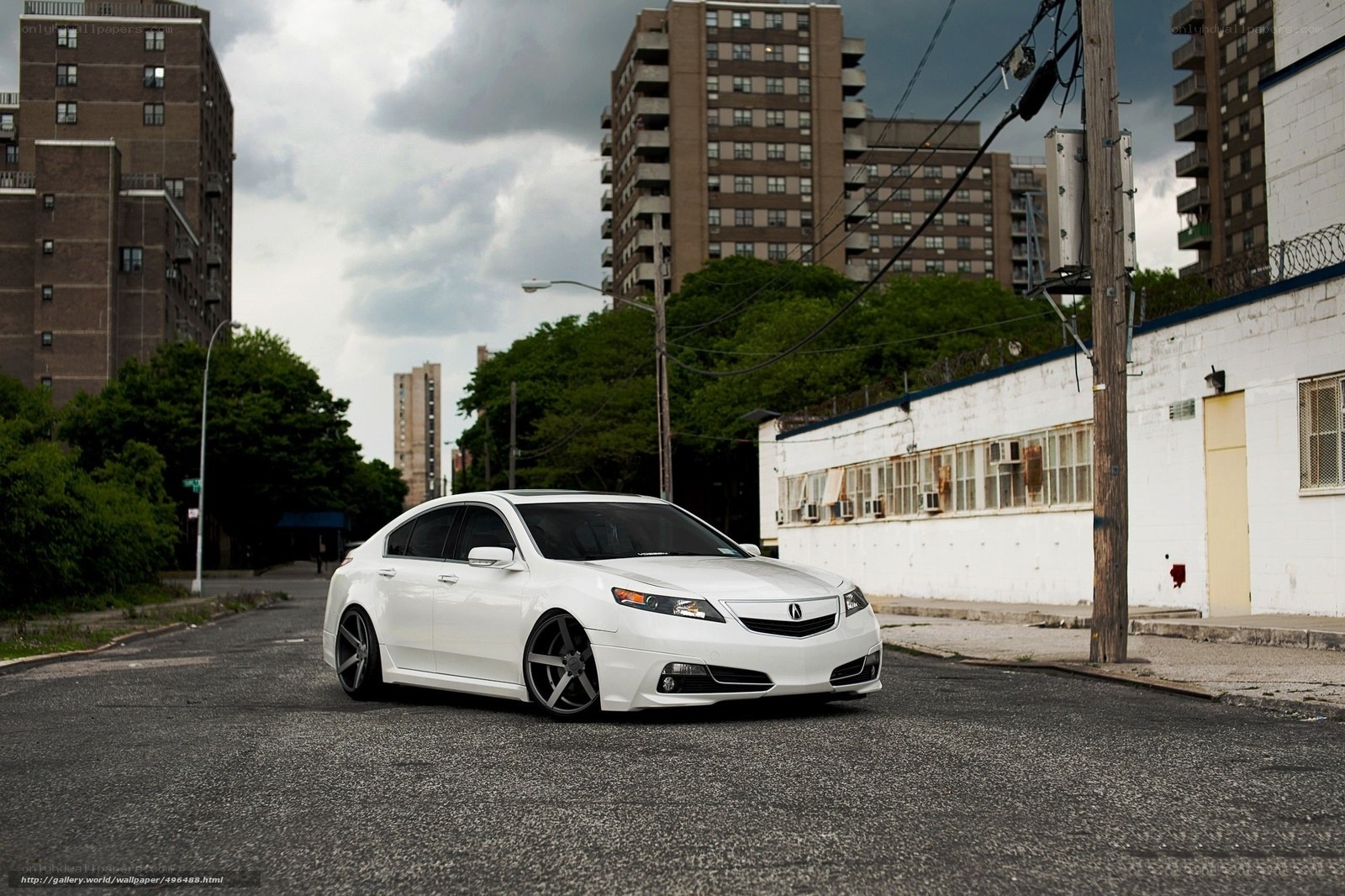 white acura in urban setting
