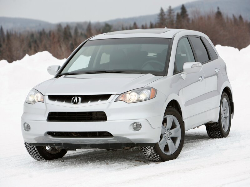 White Acura RDX in snow