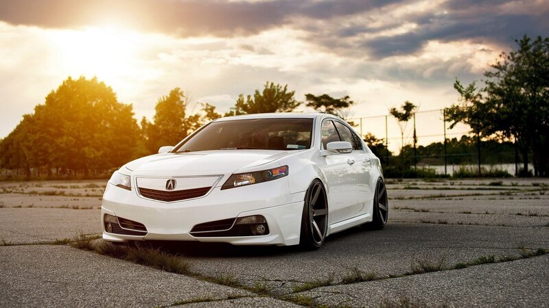 white acura tl at sunset