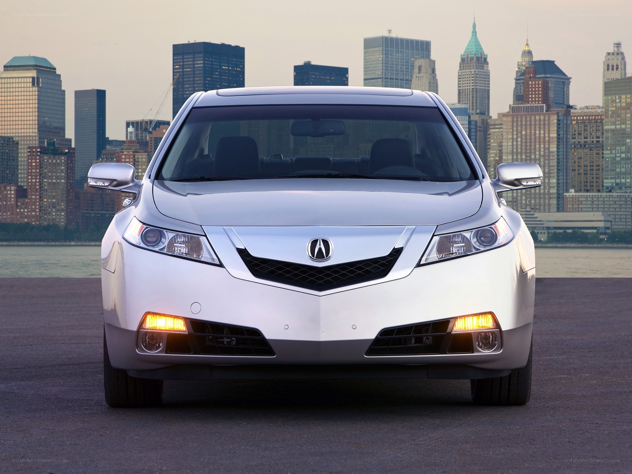 White Acura TL in city