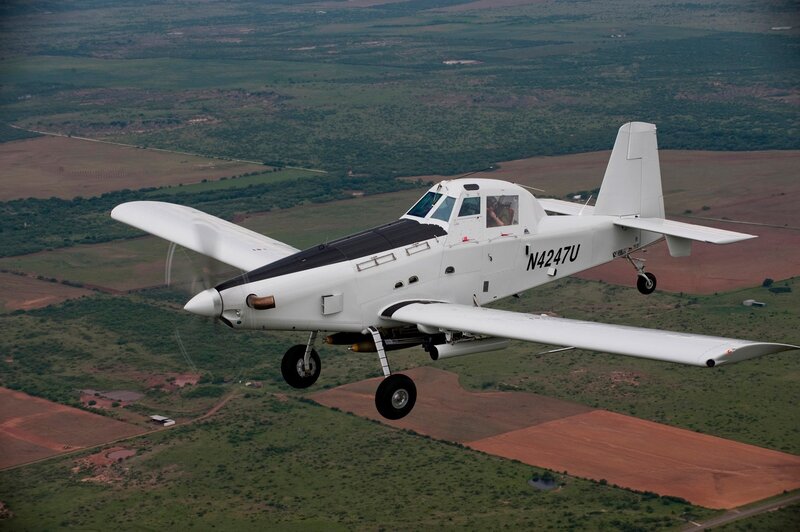 White Aircraft in Flight — Calm