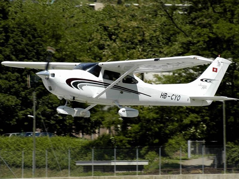 White airplane in flight