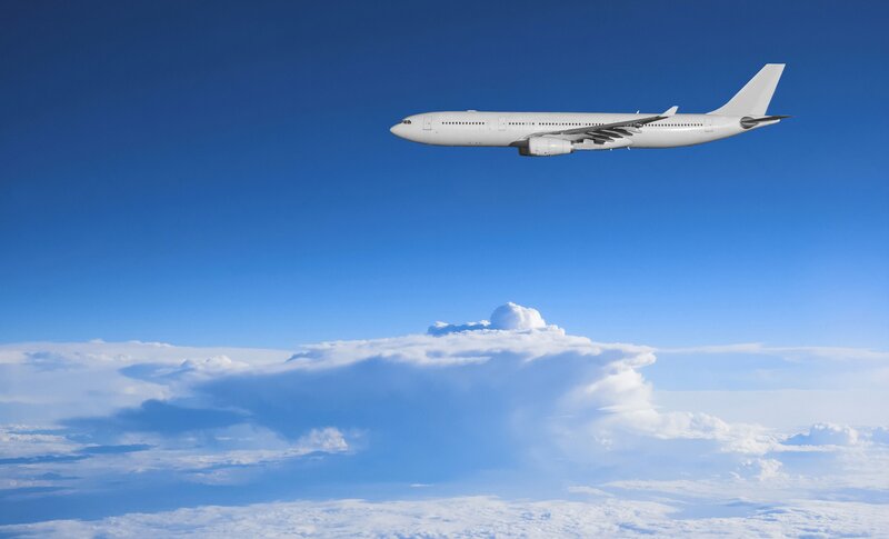 White Airplane in Sky — Blue, Serene