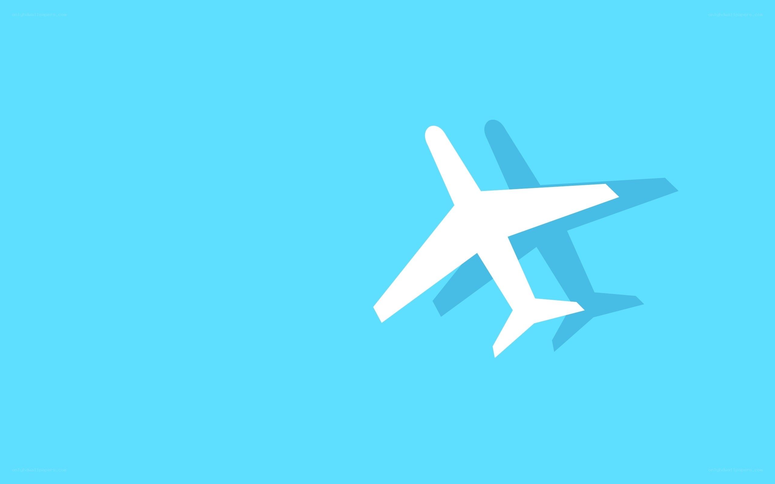 white airplane on blue sky