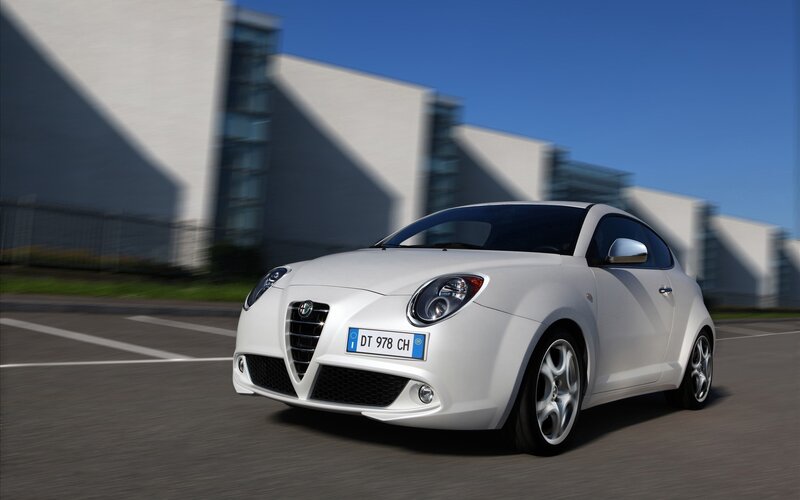 white alfa romeo car in motion