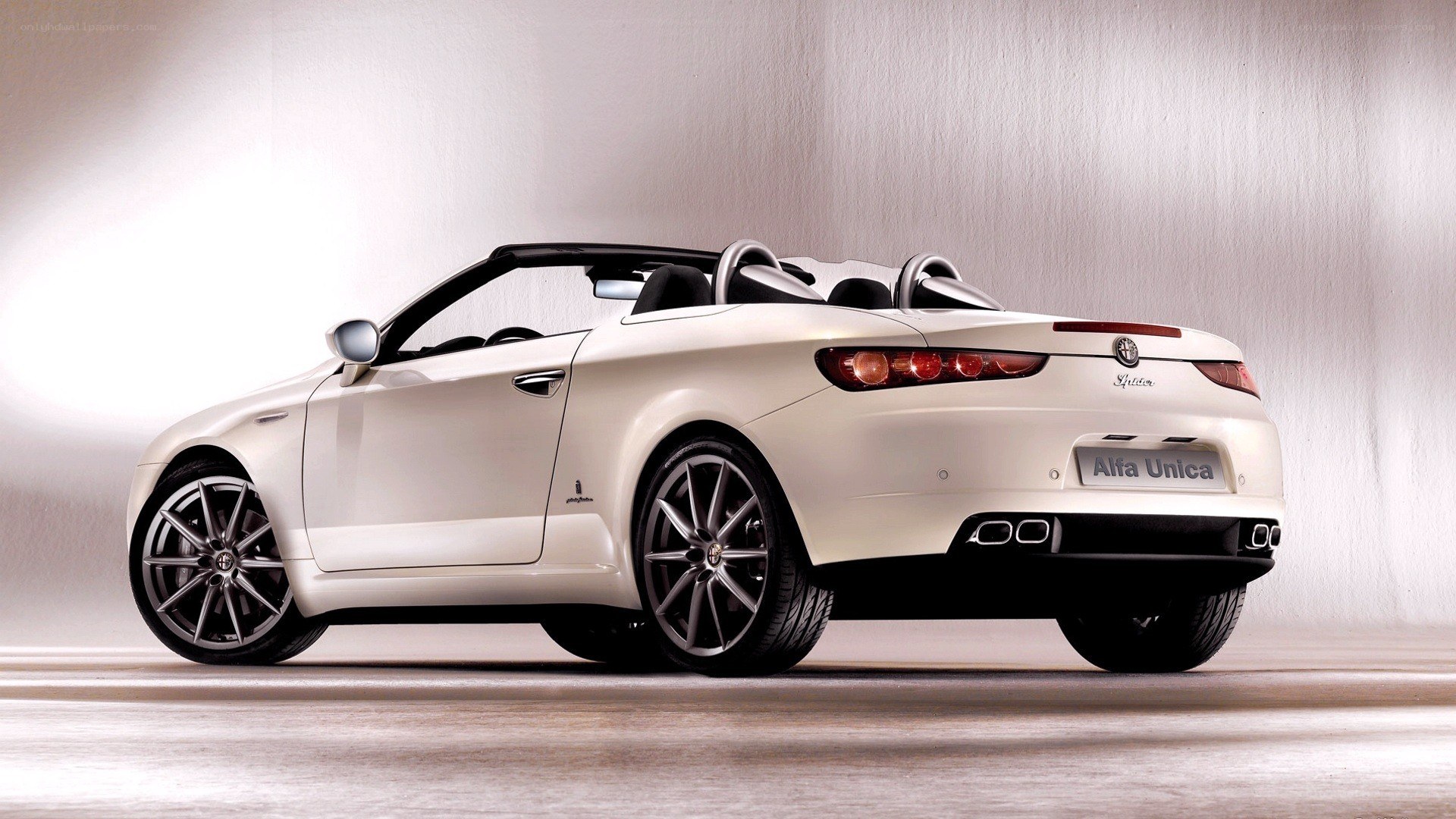 white alfa romeo convertible
