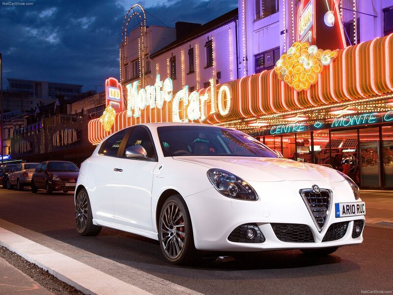 White Alfa Romeo Giulietta at night