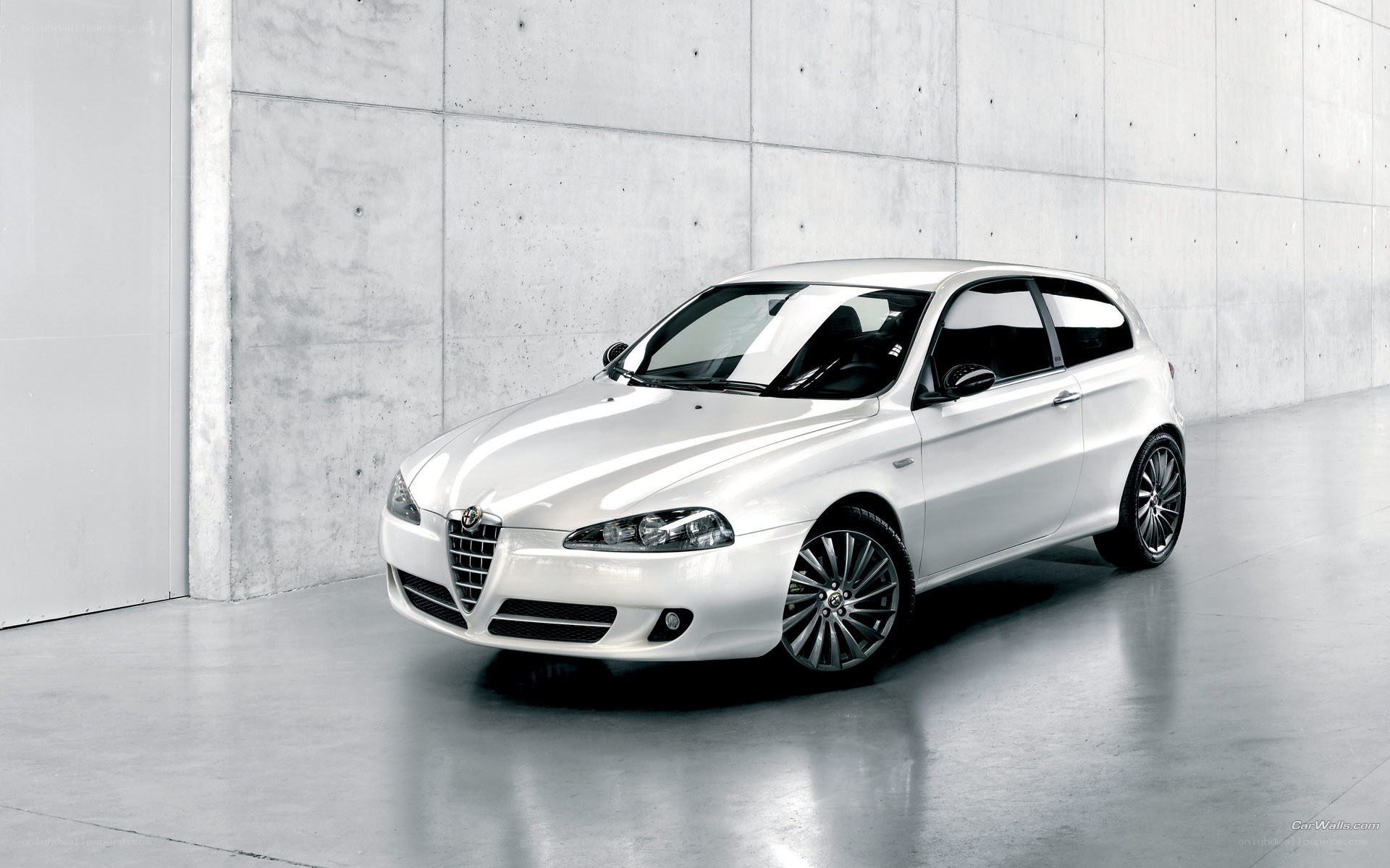 white alfa romeo hatchback