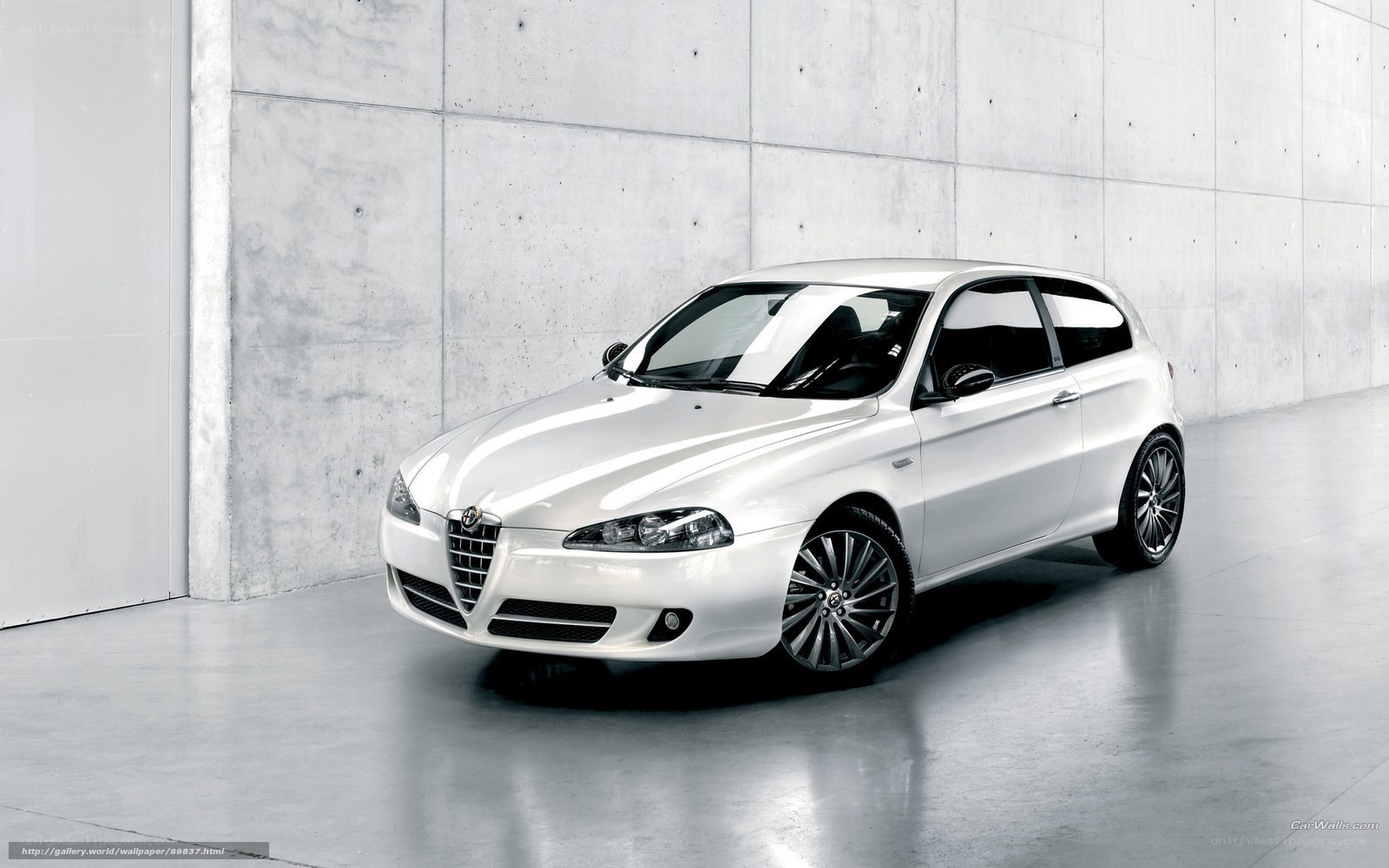 White Alfa Romeo in a studio