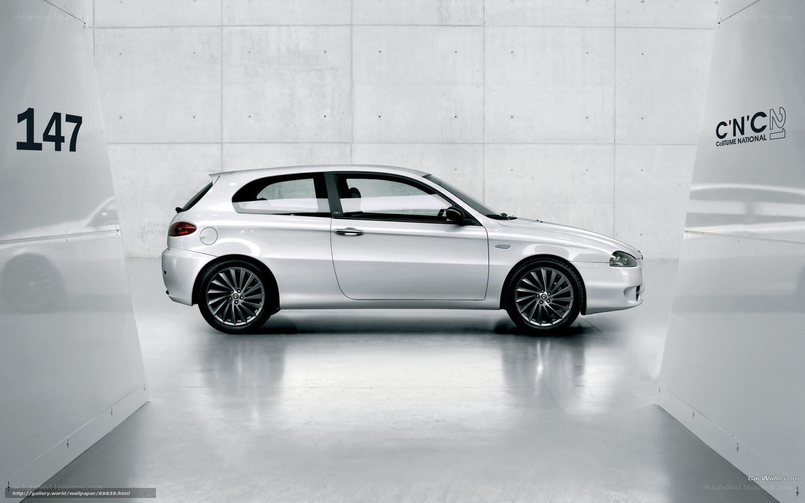 white alfa romeo in showroom