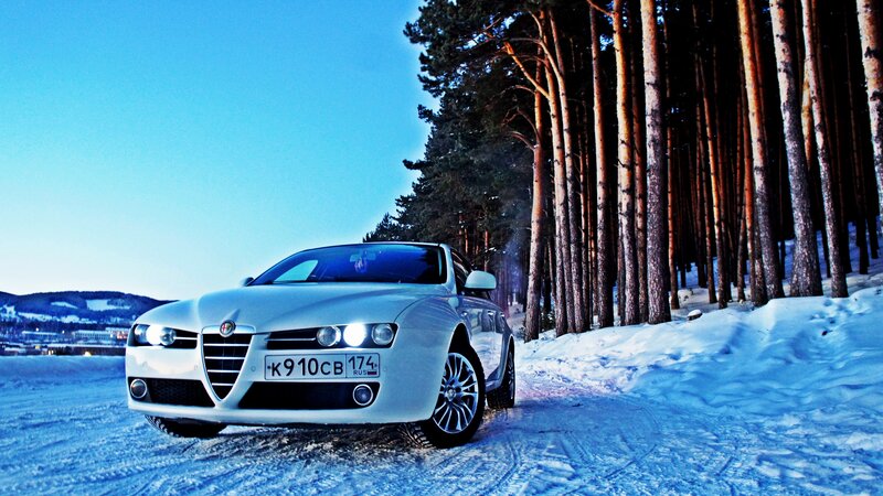 White Alfa Romeo in Snow