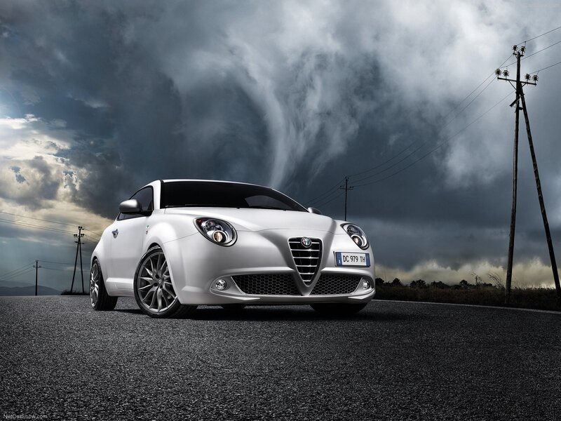 White Alfa Romeo in stormy landscape