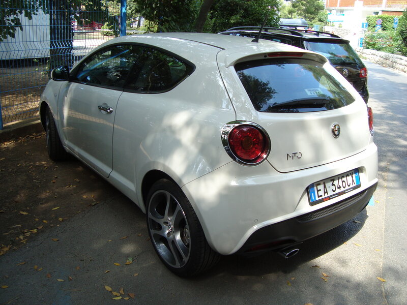 white alfa romeo mt3 parked