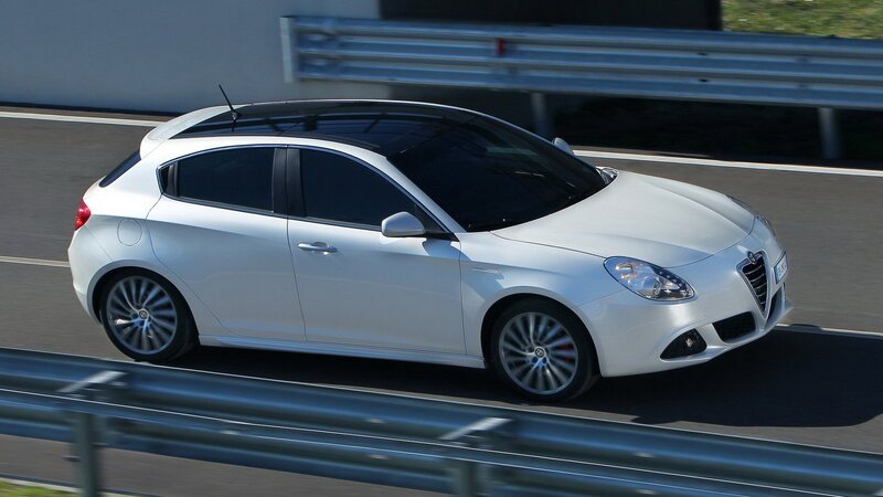 white alfa romeo on a racetrack