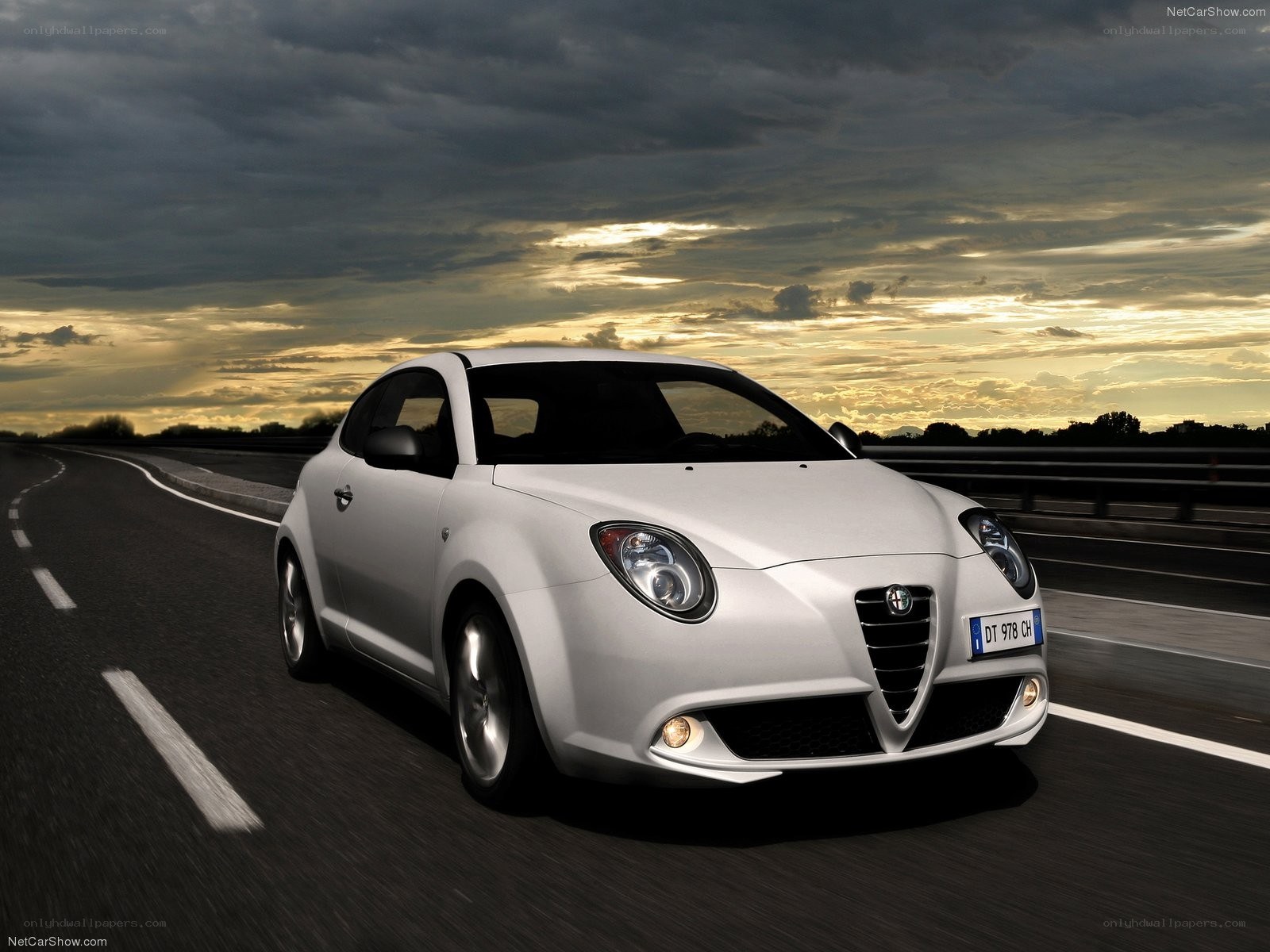 white alfa romeo on highway