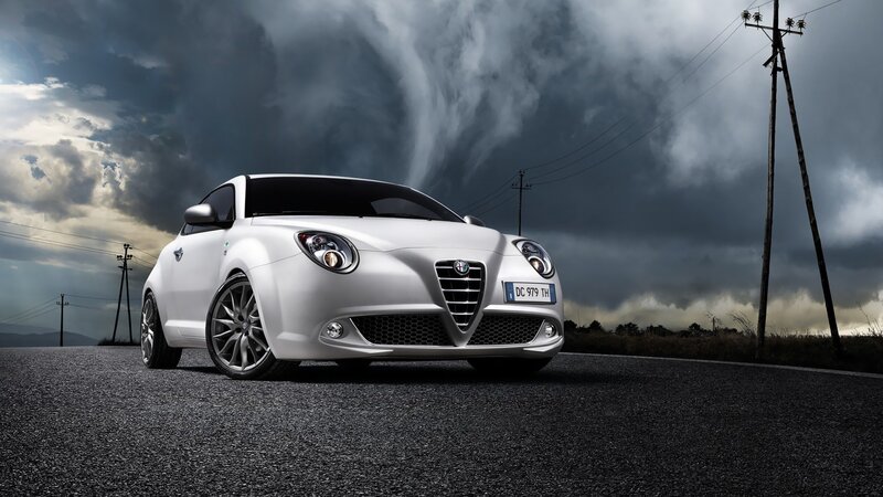 White Alfa Romeo on stormy road