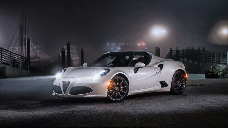White Alfa Romeo sports car at night
