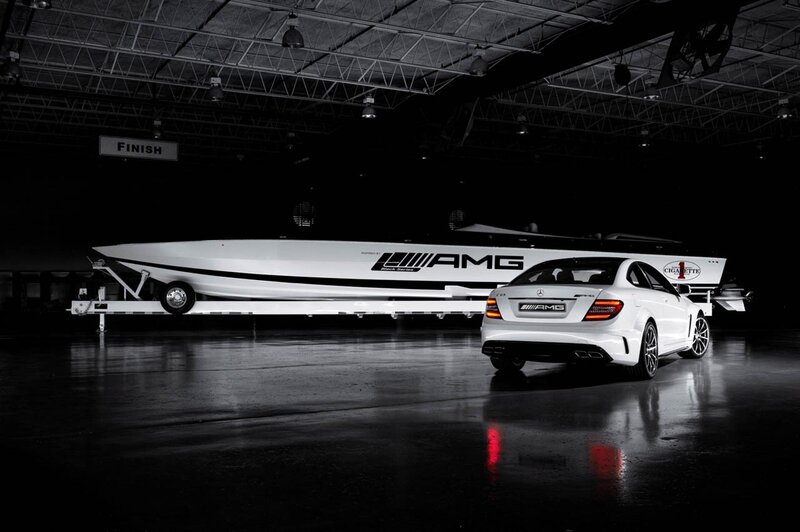 White AMG car and boat