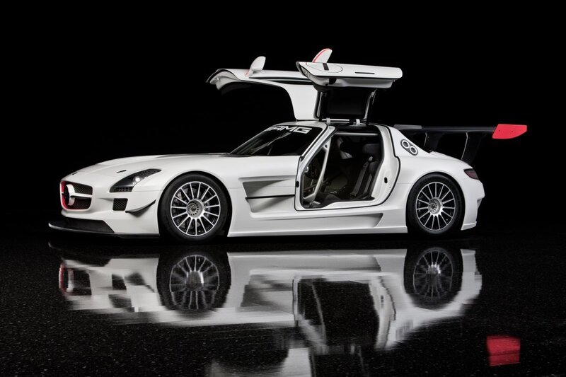 White AMG race car with open doors