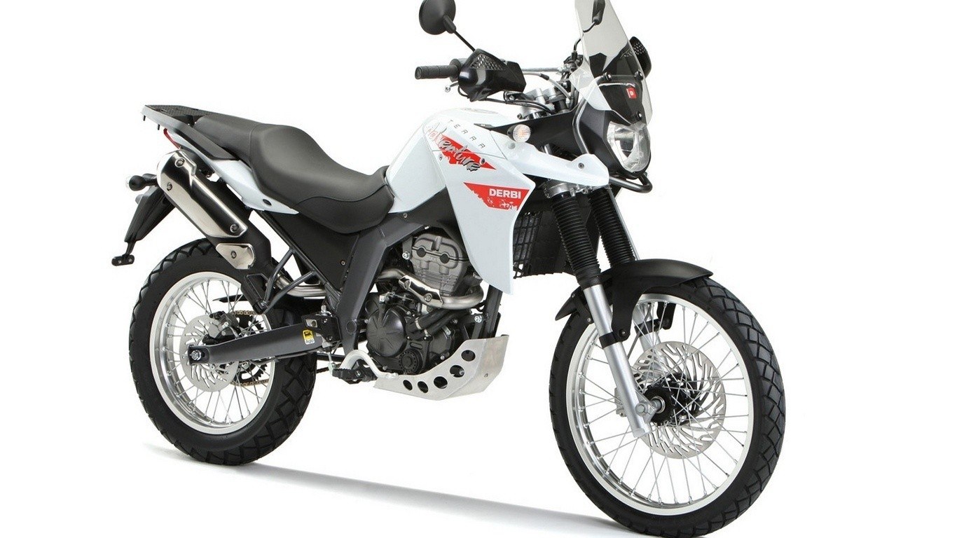 white and black adventure motorcycle