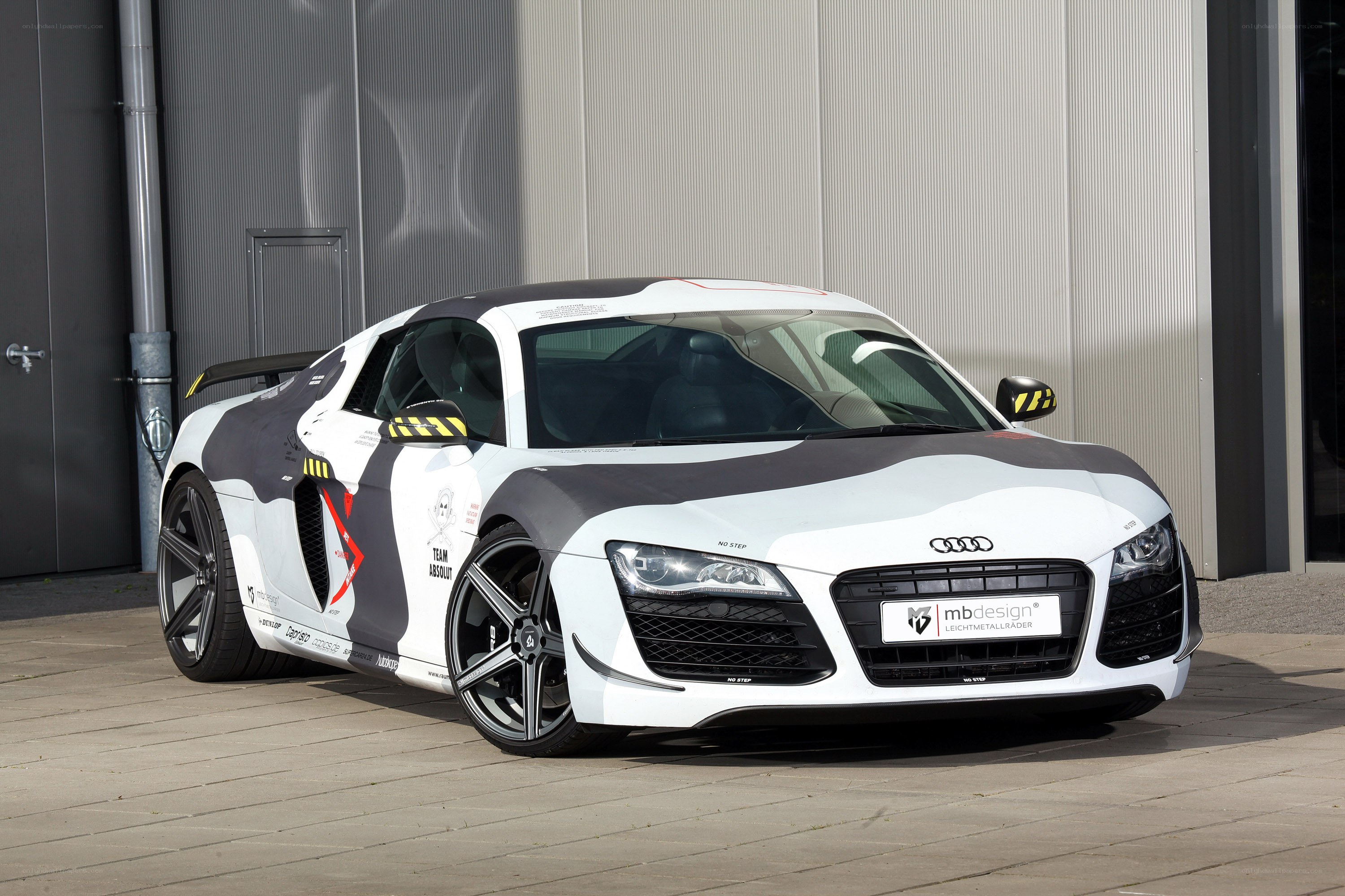 white and black camo sports car