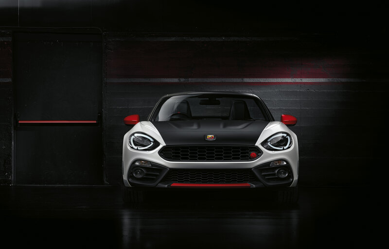 white and black car in garage
